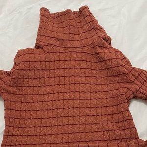 Burned orange turtle neck